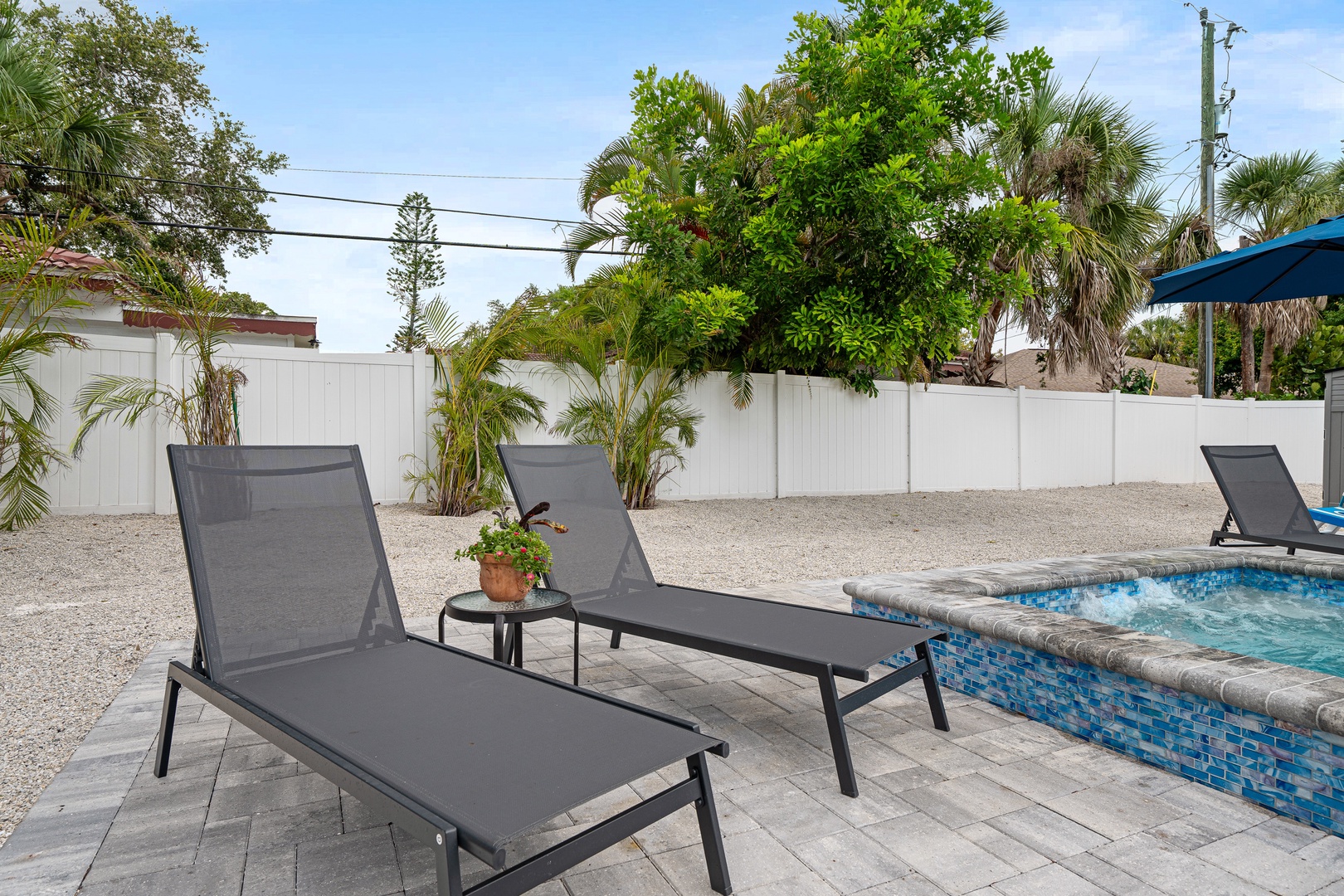 Stretch out on the sun loungers by your private pool, surrounded by lush tropical palms and the warm Florida breeze. Your perfect poolside retreat awaits.