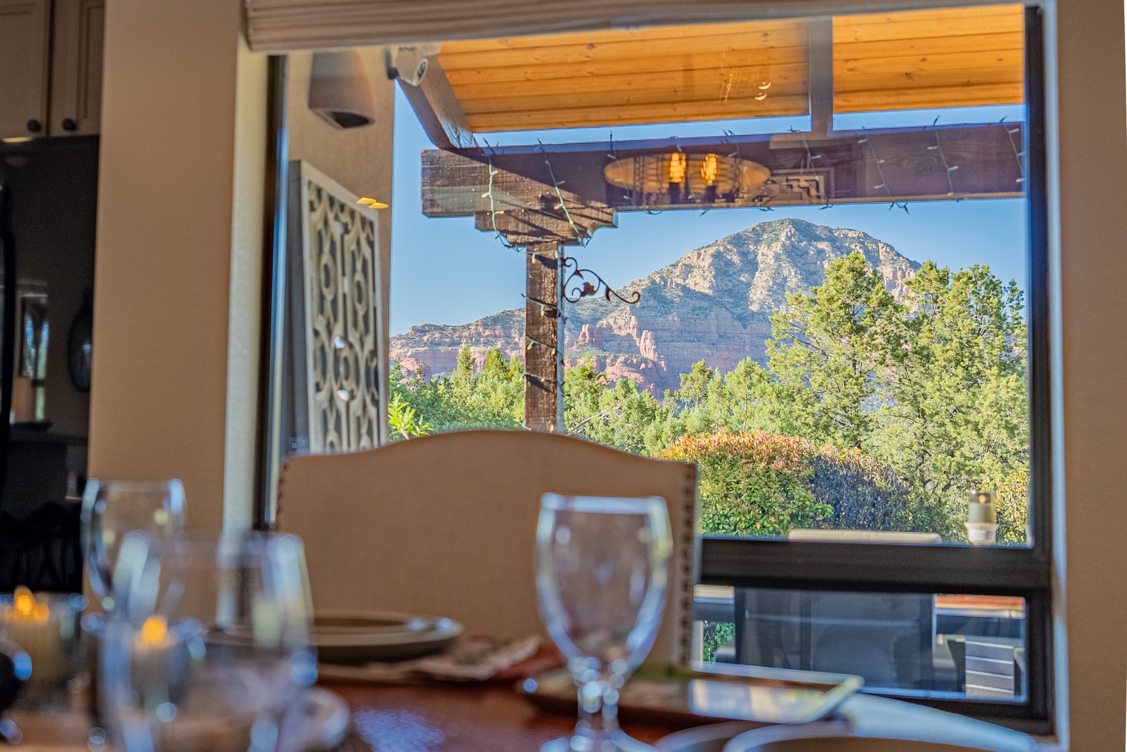 Your dining table frames a stunning view of the red rocks