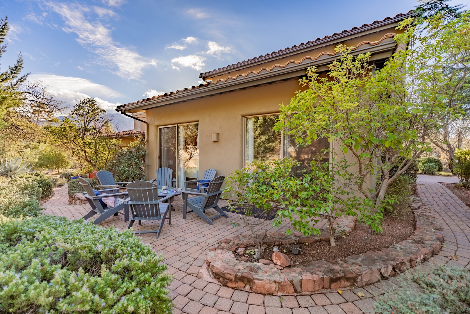 The property's private patio awaits with comfortable seating for your outdoor relaxation.