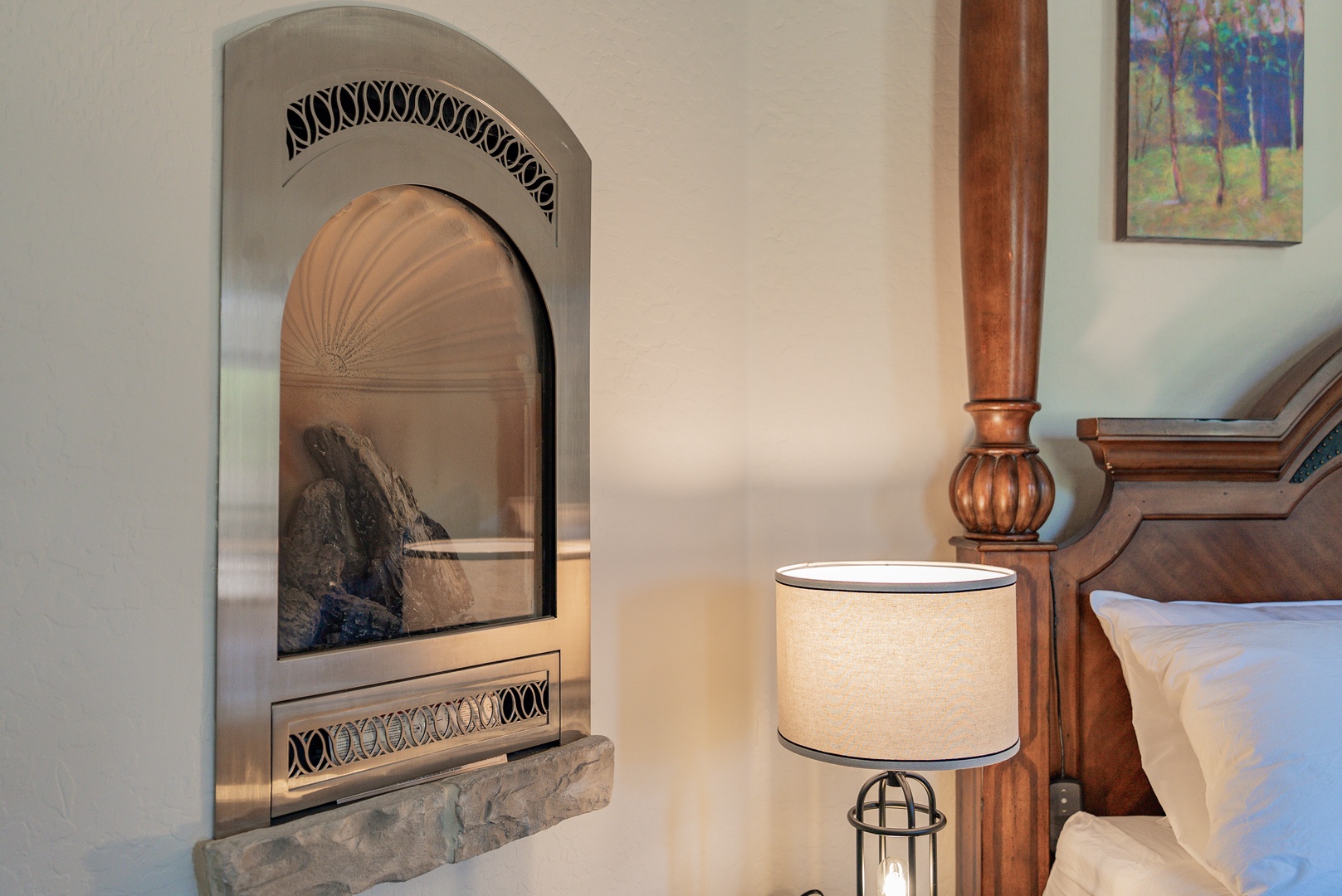 Cozy up by your elegant arched fireplace, where warm flames and refined details create the perfect romantic retreat.
