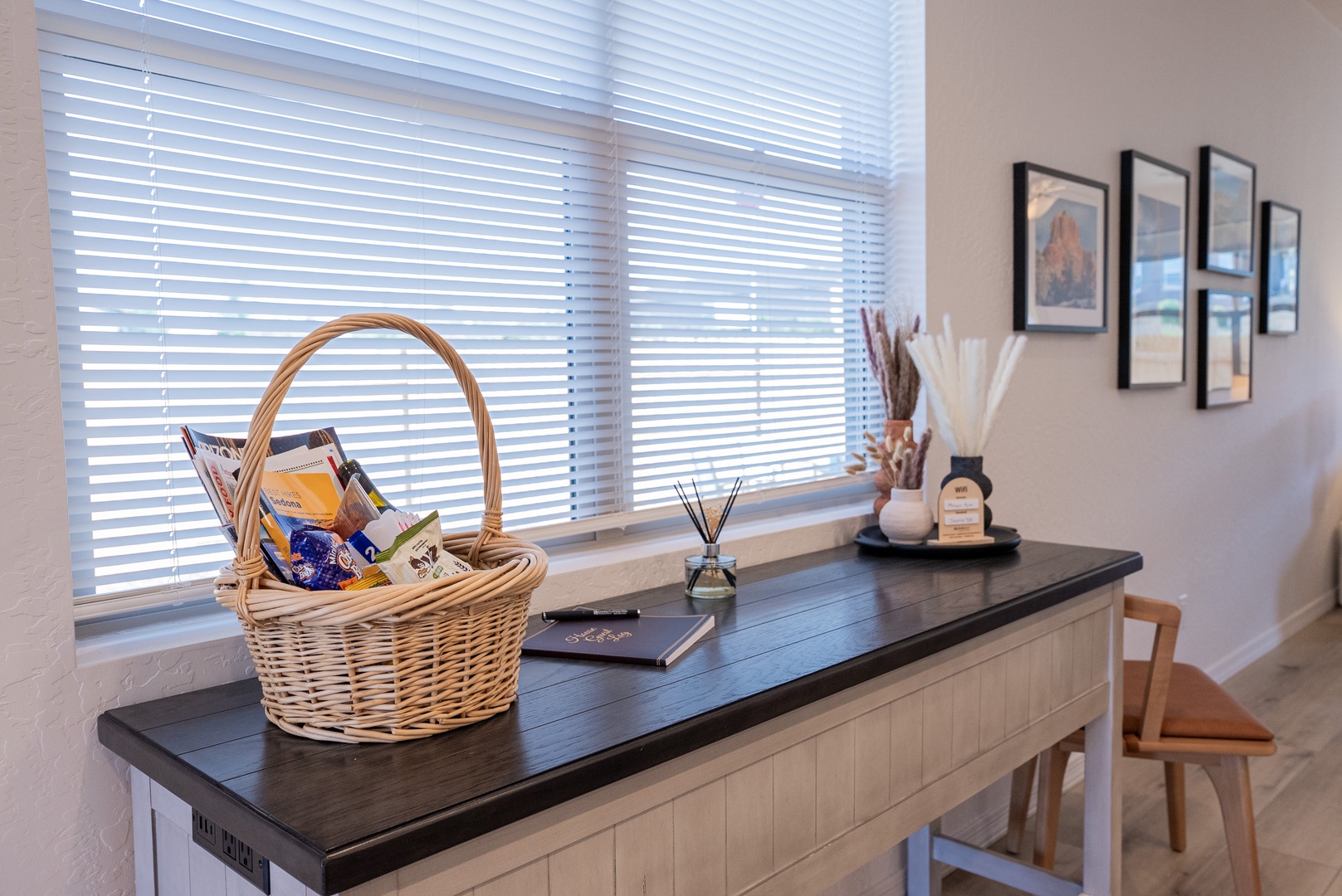 Welcome table displays a basket of local info and aromatic diffuser