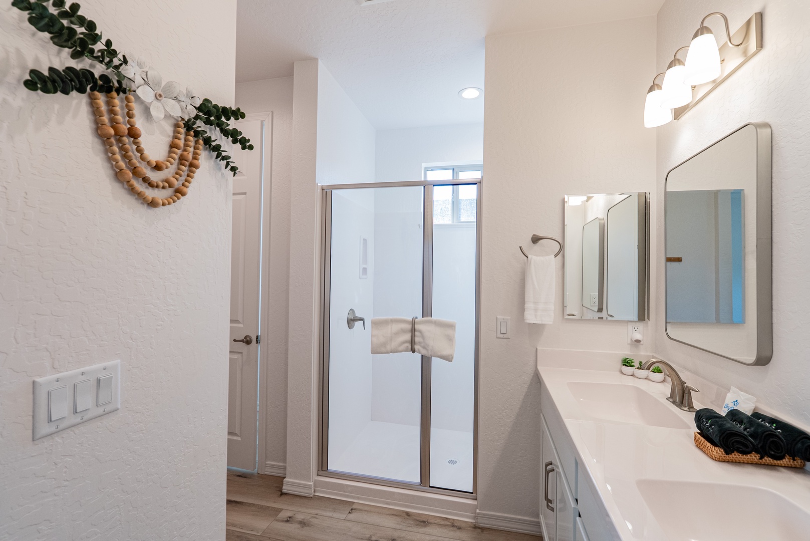 Spa-like bathroom with modern amenities, glass-enclosed shower