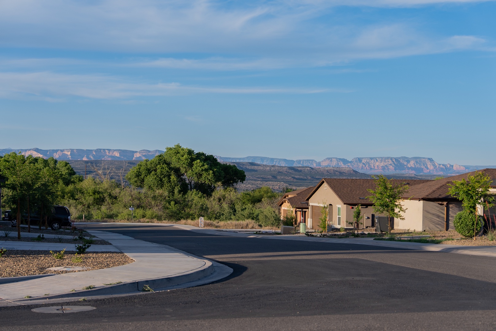 Mountain backdrop creates a scenic southwestern setting.