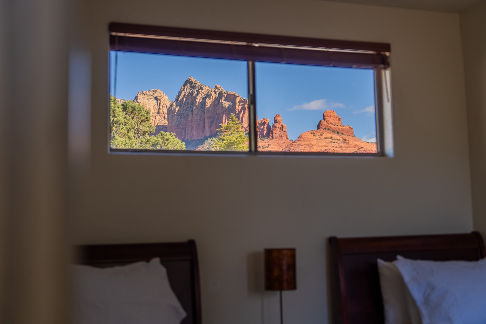 Wake up to breathtaking red rocks through your bedroom window