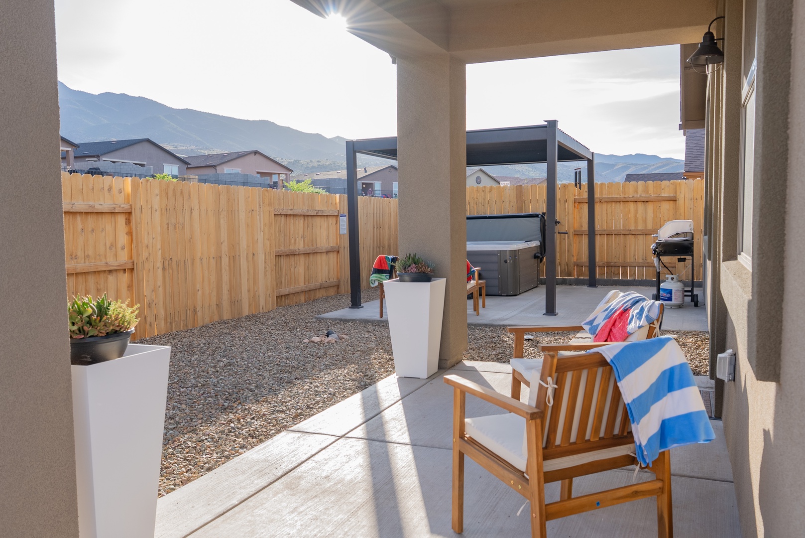 Relax in your private backyard oasis with mountain views