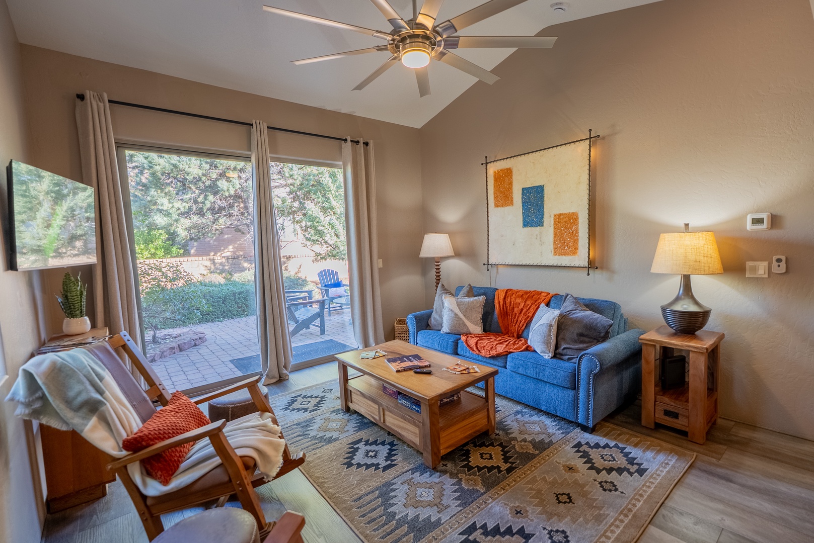 Luna living features a luxury pull out sofa, television, and thoughtful decor