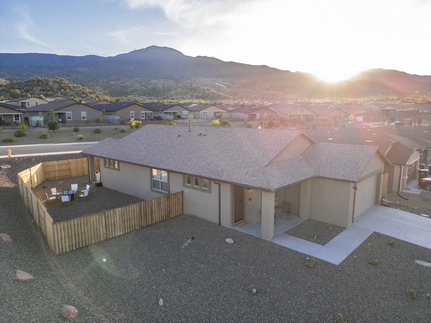 Home beneath stunning mountain with private fenced backyard