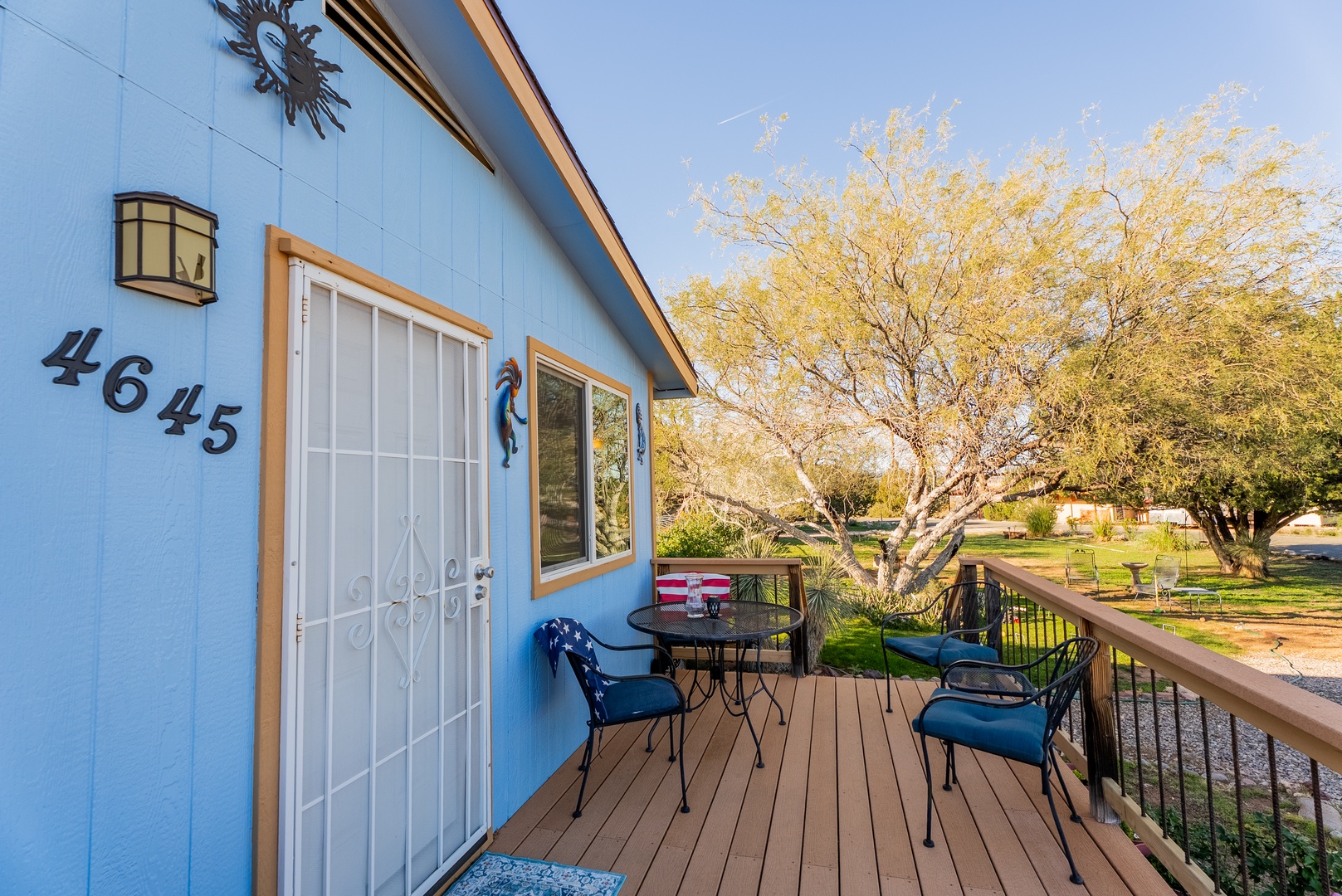 Step onto your private deck with comfortable seating where you can relax and unwind while taking in the peaceful neighborhood views.