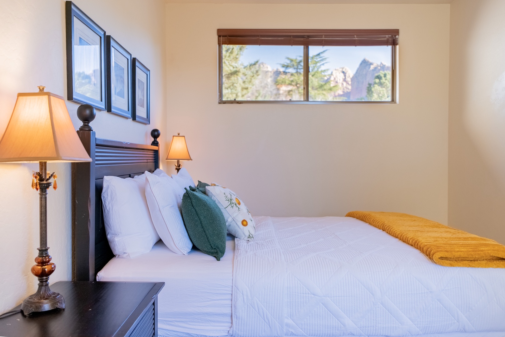 Drift off in your cozy bedroom with crisp linens and mountain views framing your peaceful retreat.