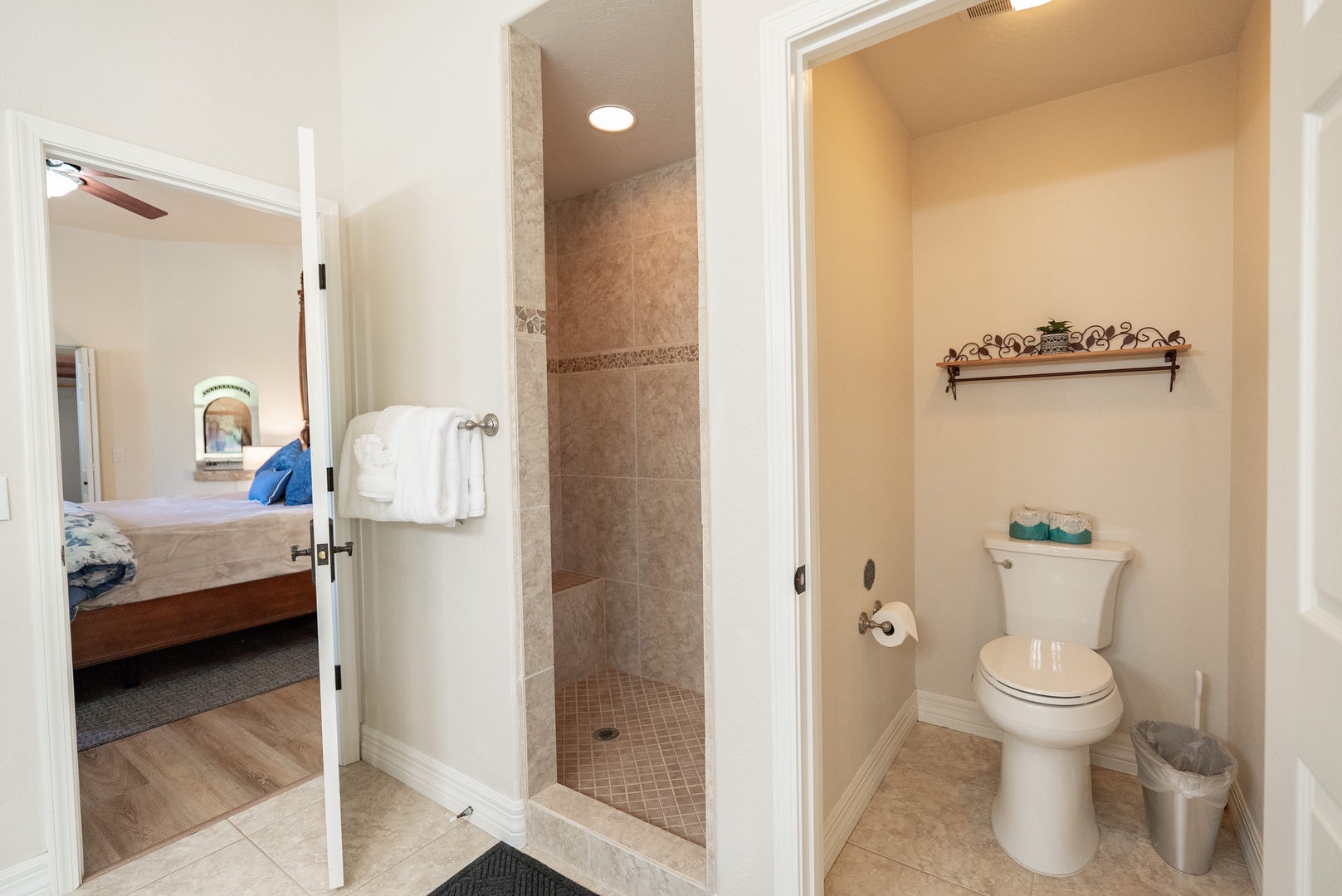 Your private ensuite features a refreshing tiled shower and separate powder room for ultimate convenience.