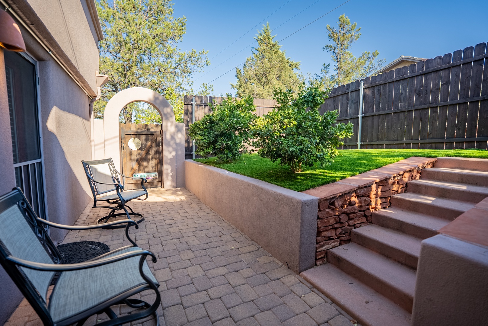 A private patio out to the side of the house is perfect for morning coffee