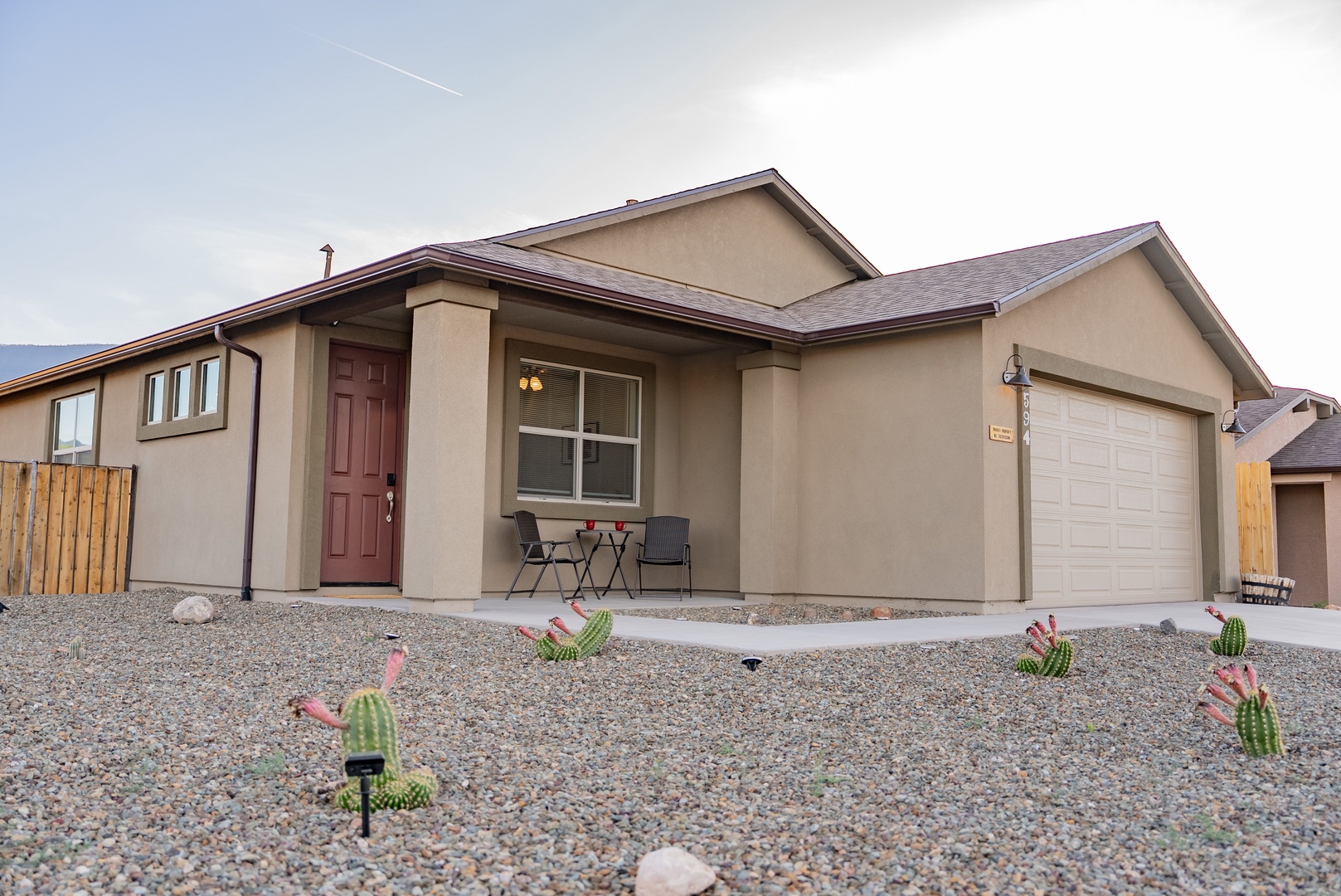 Modern single-story home with desert landscaping