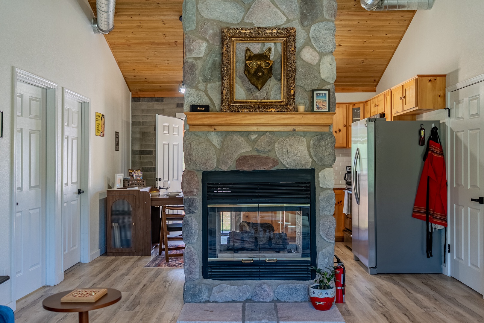 The heart of the home is its dual sided fireplace in the center