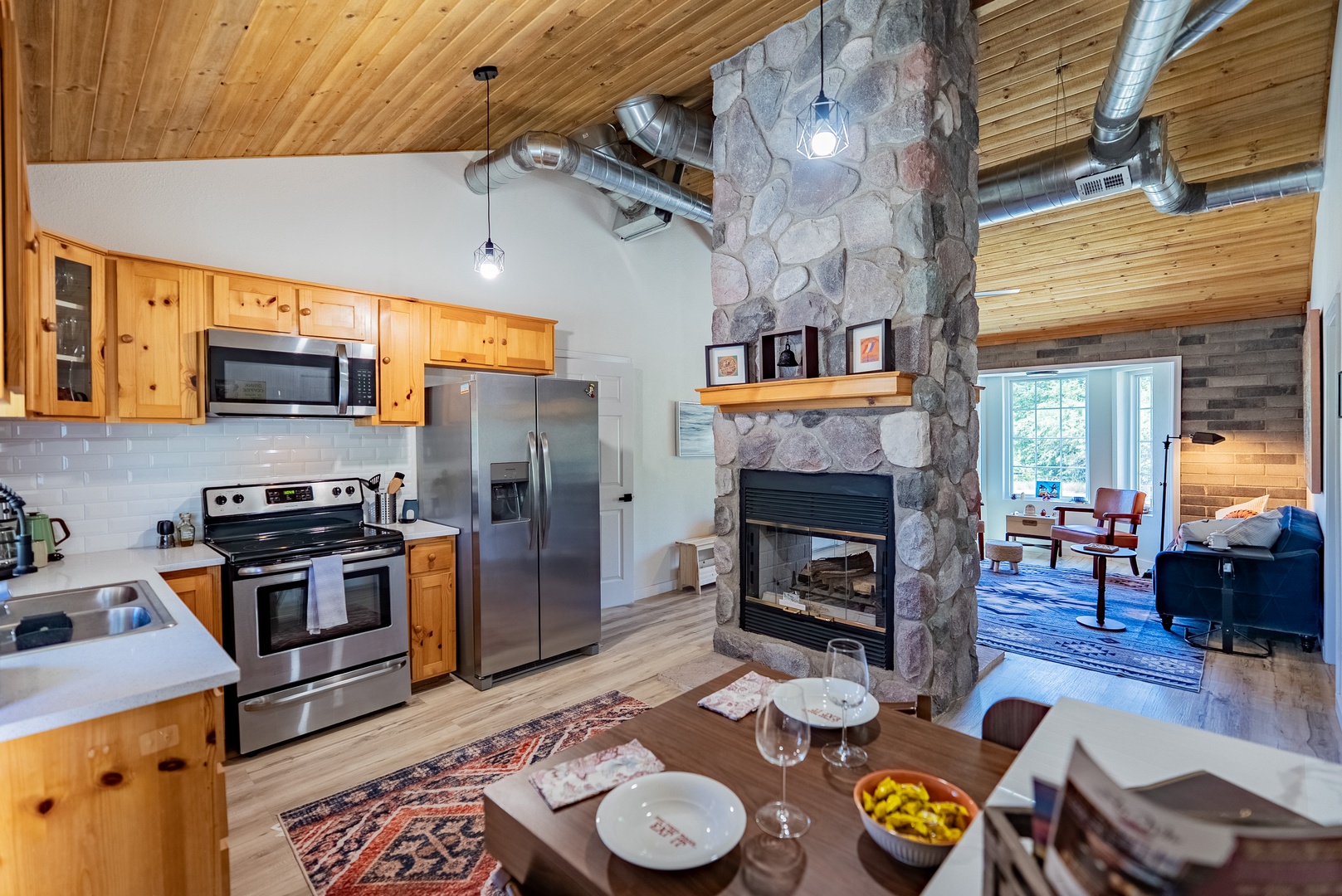Well appointed kitchen features space saving fold out table