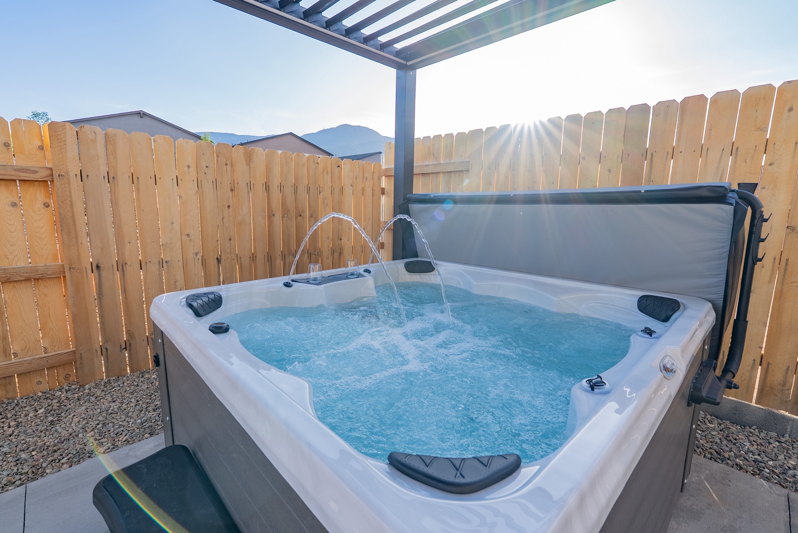 Unwind in your private hot tub with mountain views