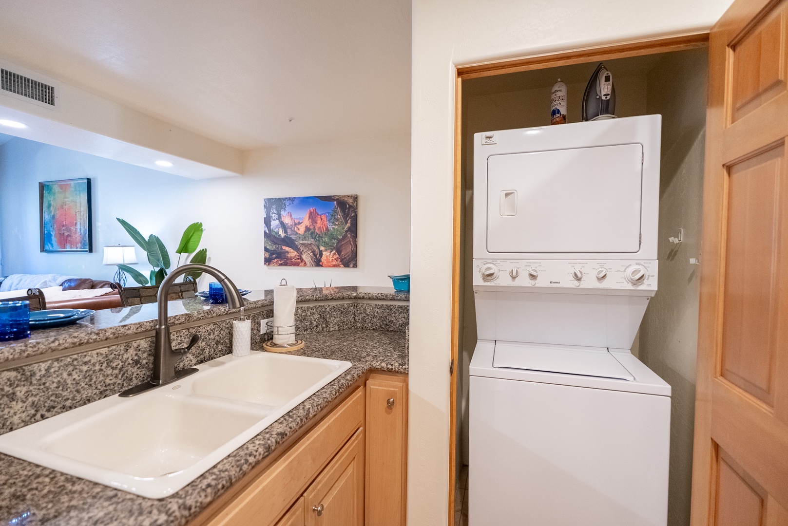 Fresh laundry made easy with your in-unit washer and dryer, tucked conveniently next to the kitchen for effortless living.