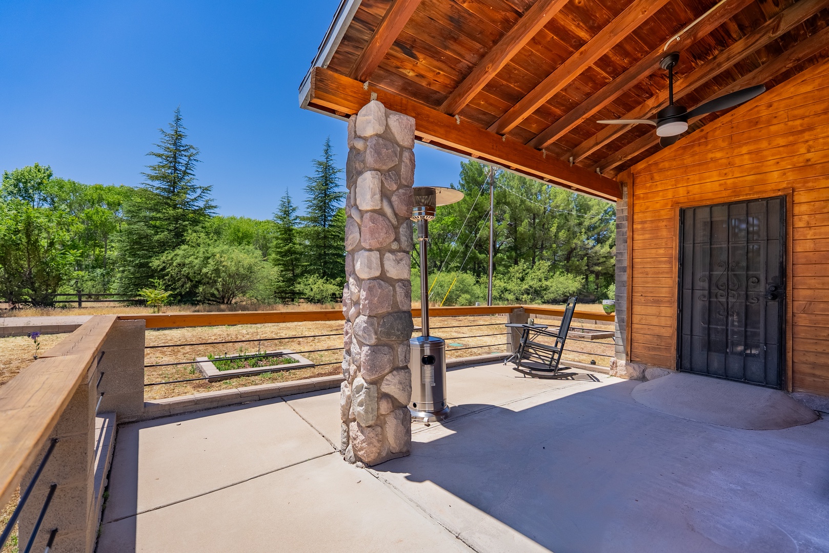 This charming cabin-style property sits on a private corner