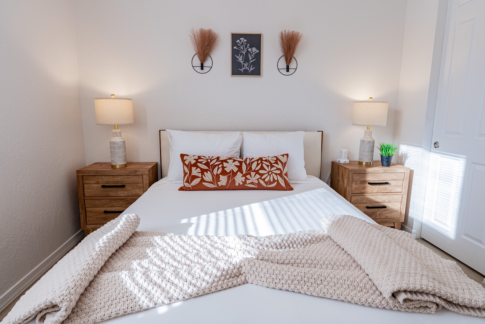 White linens and soft textures in the second Queen bedroom