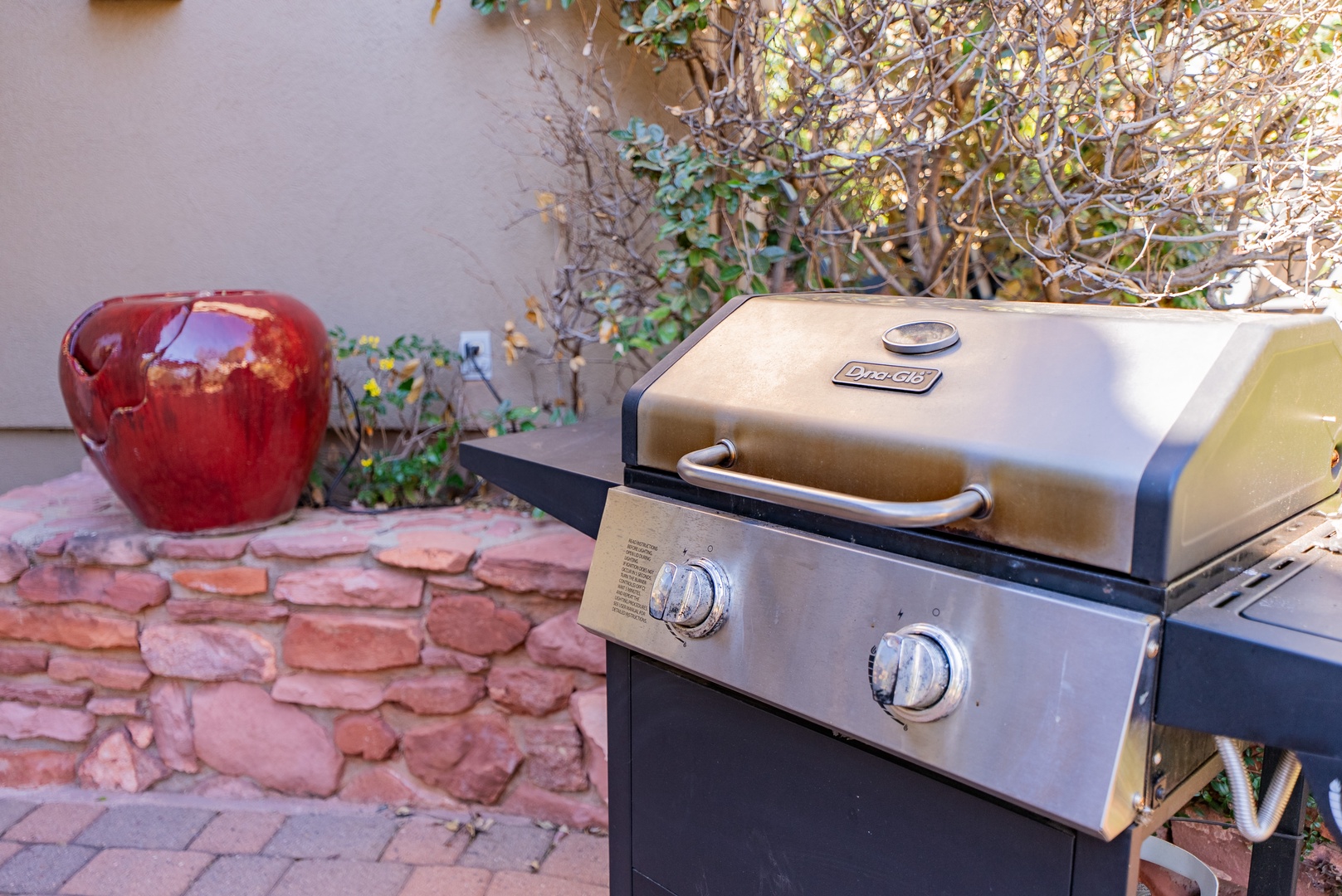 Fire up your culinary skills on this premium gas grill, perfectly positioned on your private patio for memorable outdoor dining.