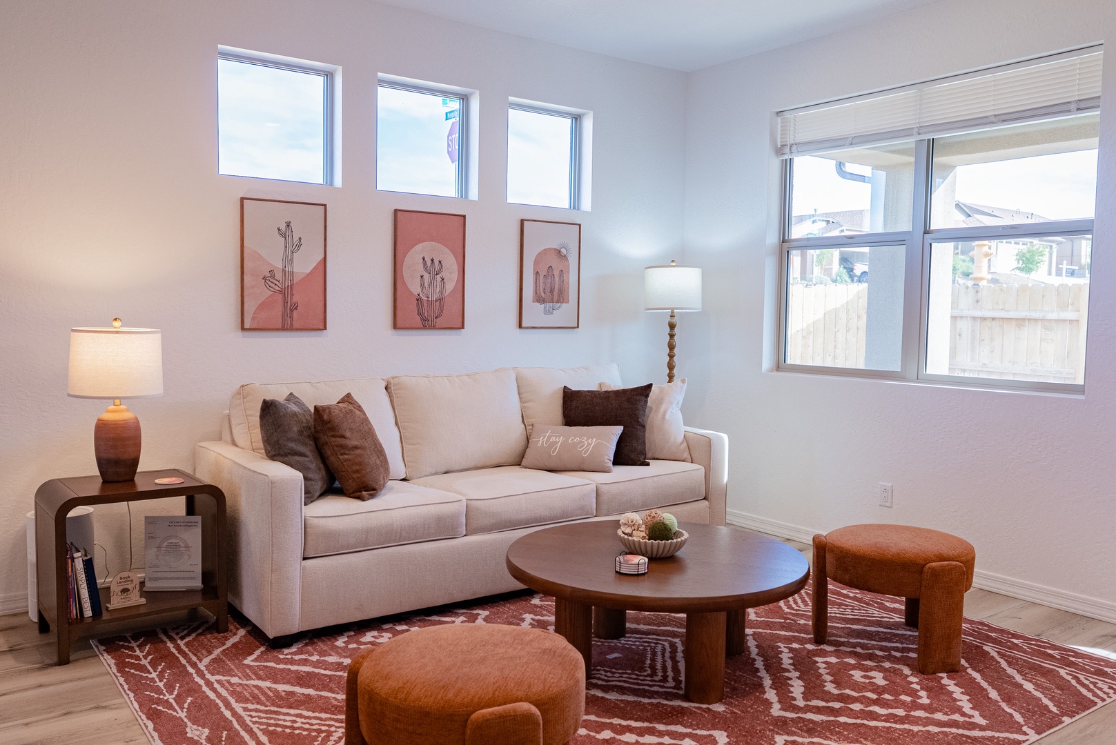 Bright, living room with plush seating and natural light