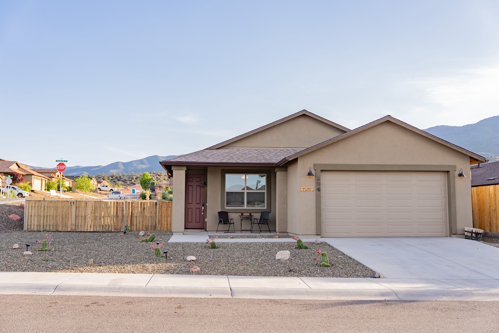 A welcoming single-story home with mountain backdrop