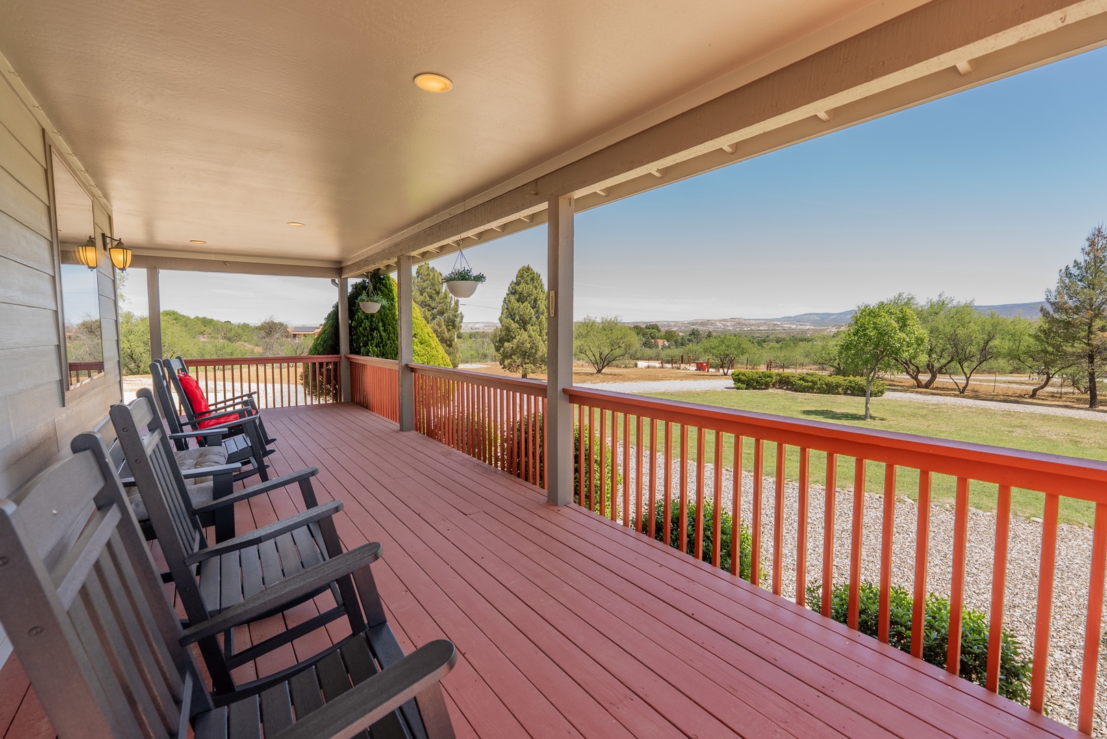 Covered deck with mountain views, perfect for coffee