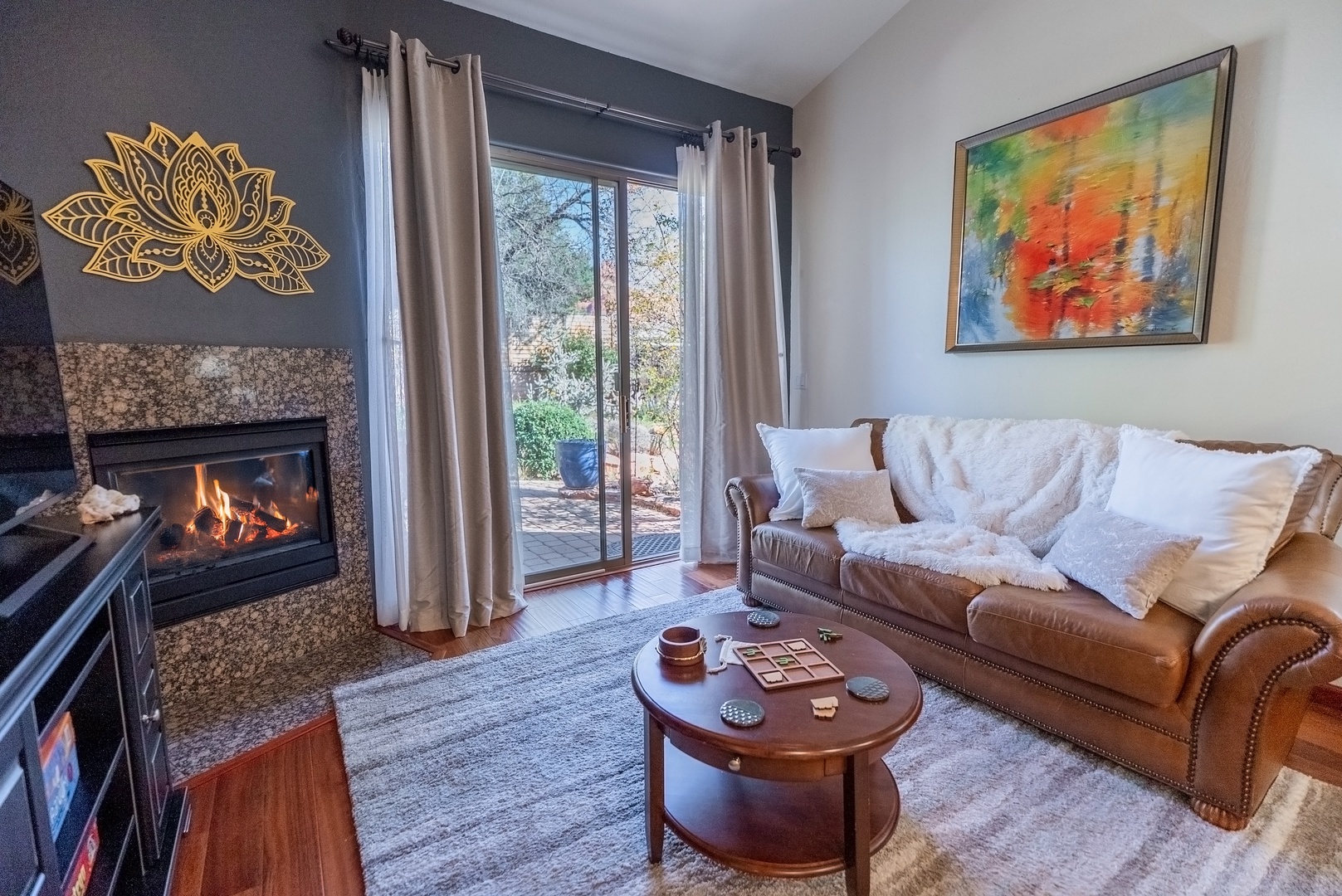 Gem's cozy living room with large sliding doors to the back patio