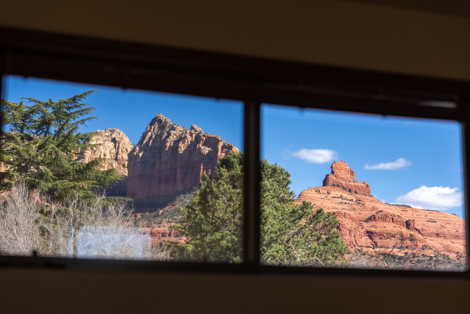 Wake up to stunning red rock formations framed perfectly through your bedroom windows, creating a natural masterpiece to start each morning.