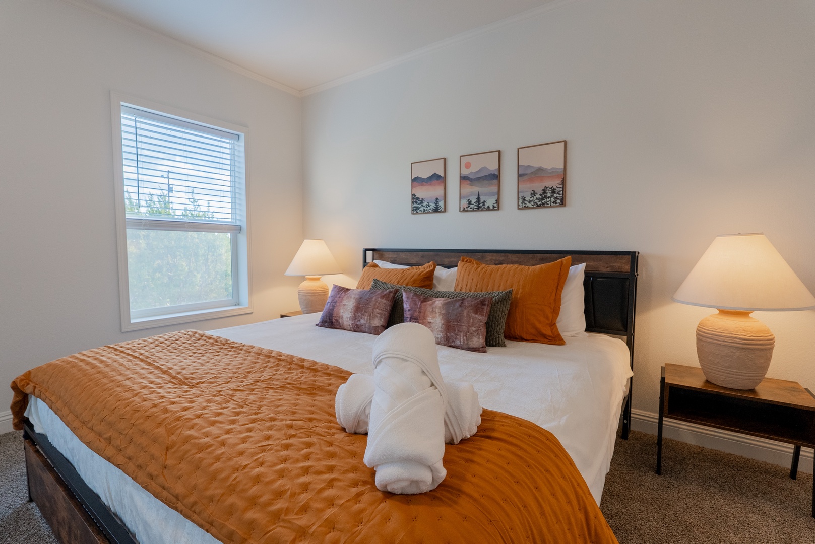 Primary King bed retreat perfect after busy days.