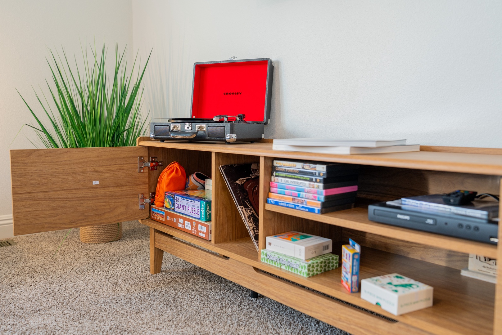 Vinyl record player, DVDS and games for your enjoyment.