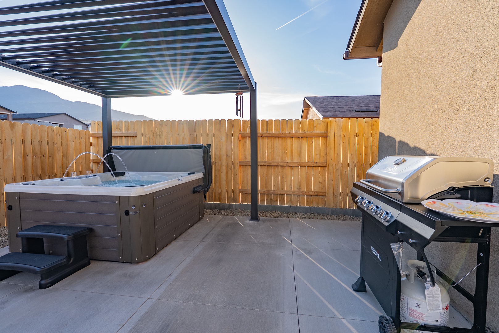 Unwind under the pergola, then fire up the BBQ for dinner