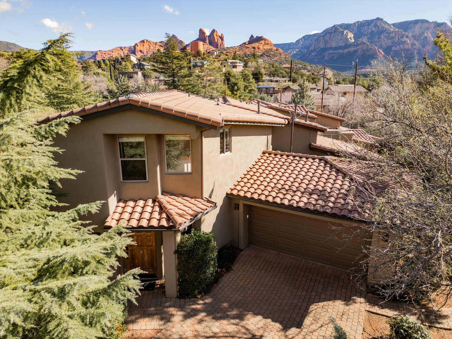 Stunning property nestled in Sedona's red rock landscape with dramatic mountain views and distinctive southwestern architecture.