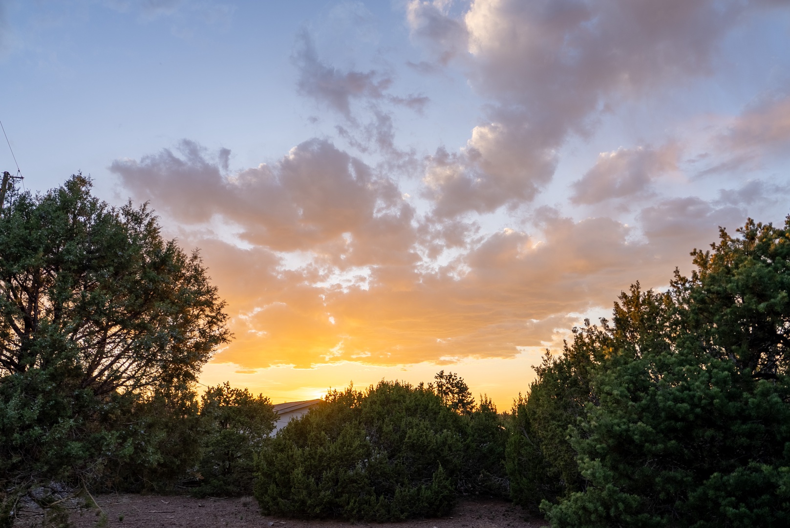 Golden sunsets in the sky above the property.