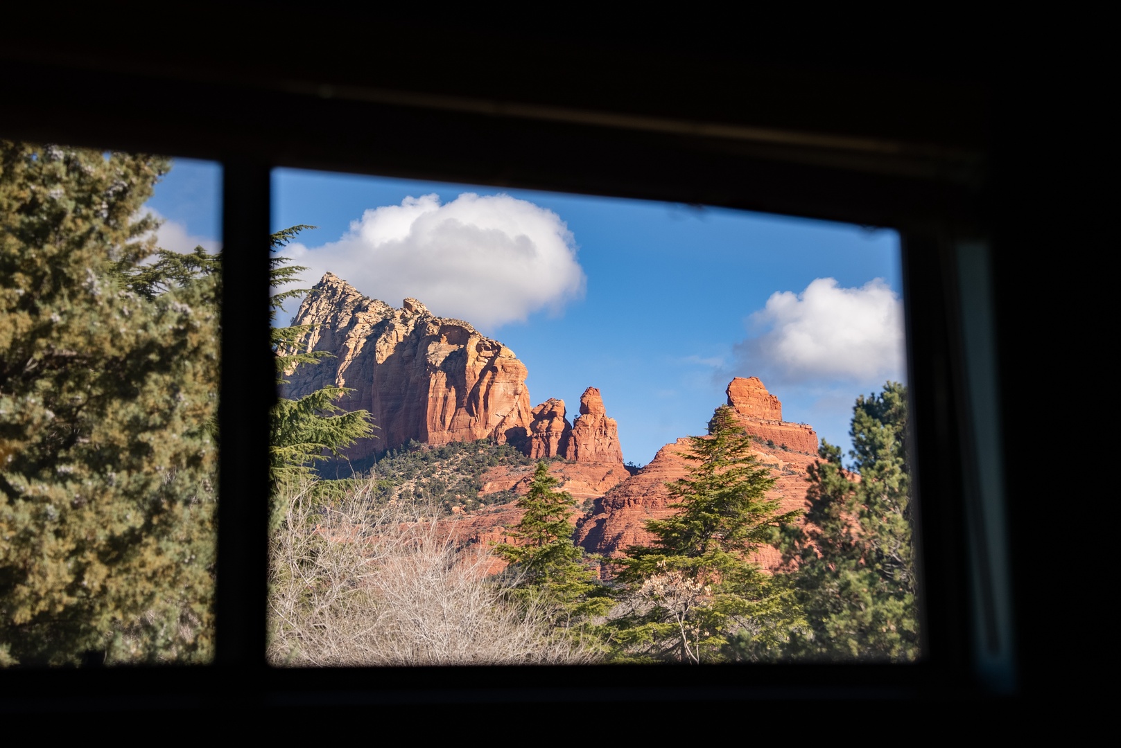 Wake up to breathtaking red rock formations framed perfectly through your window.