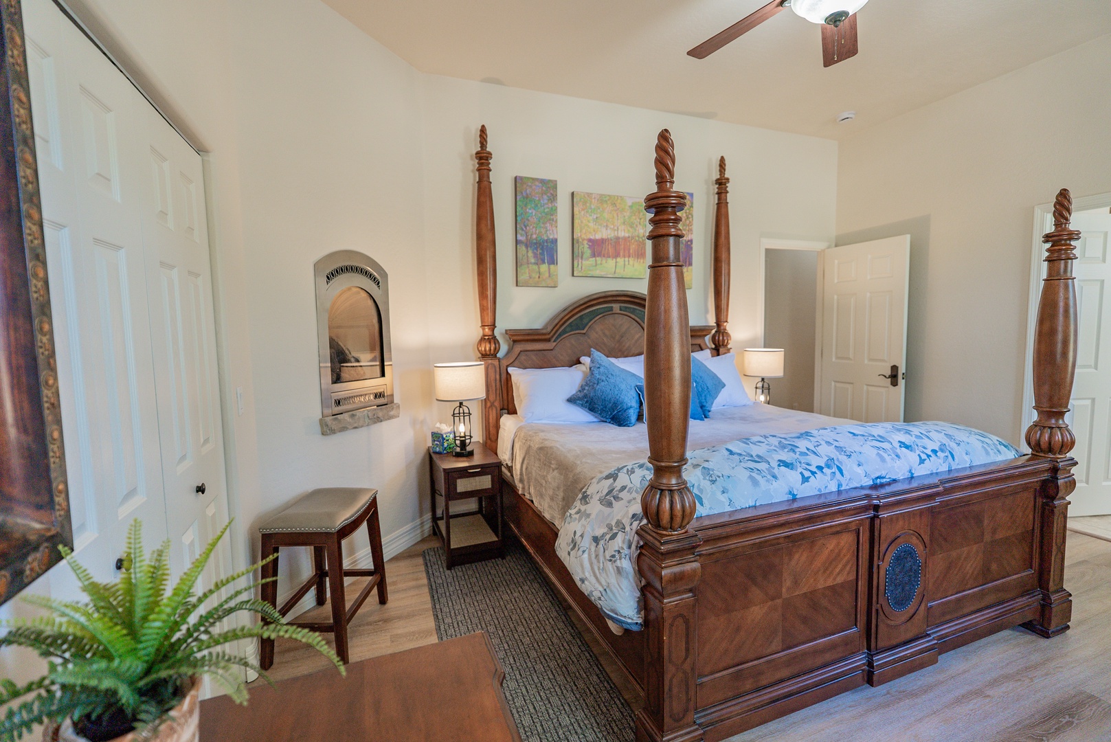 Relaxing master ensuite with desk, fireplace and comfy bed