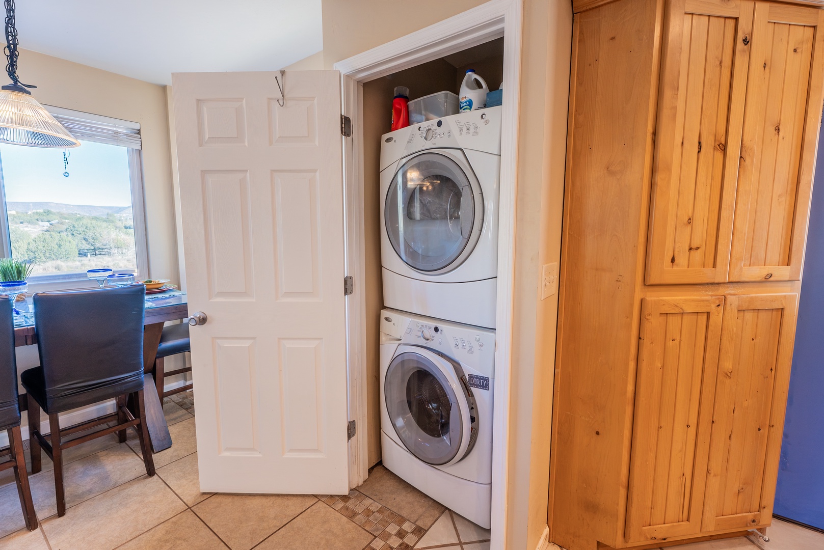 Keep your clothes fresh with your own private washer and dryer, conveniently tucked away in a closet for easy access during your stay.