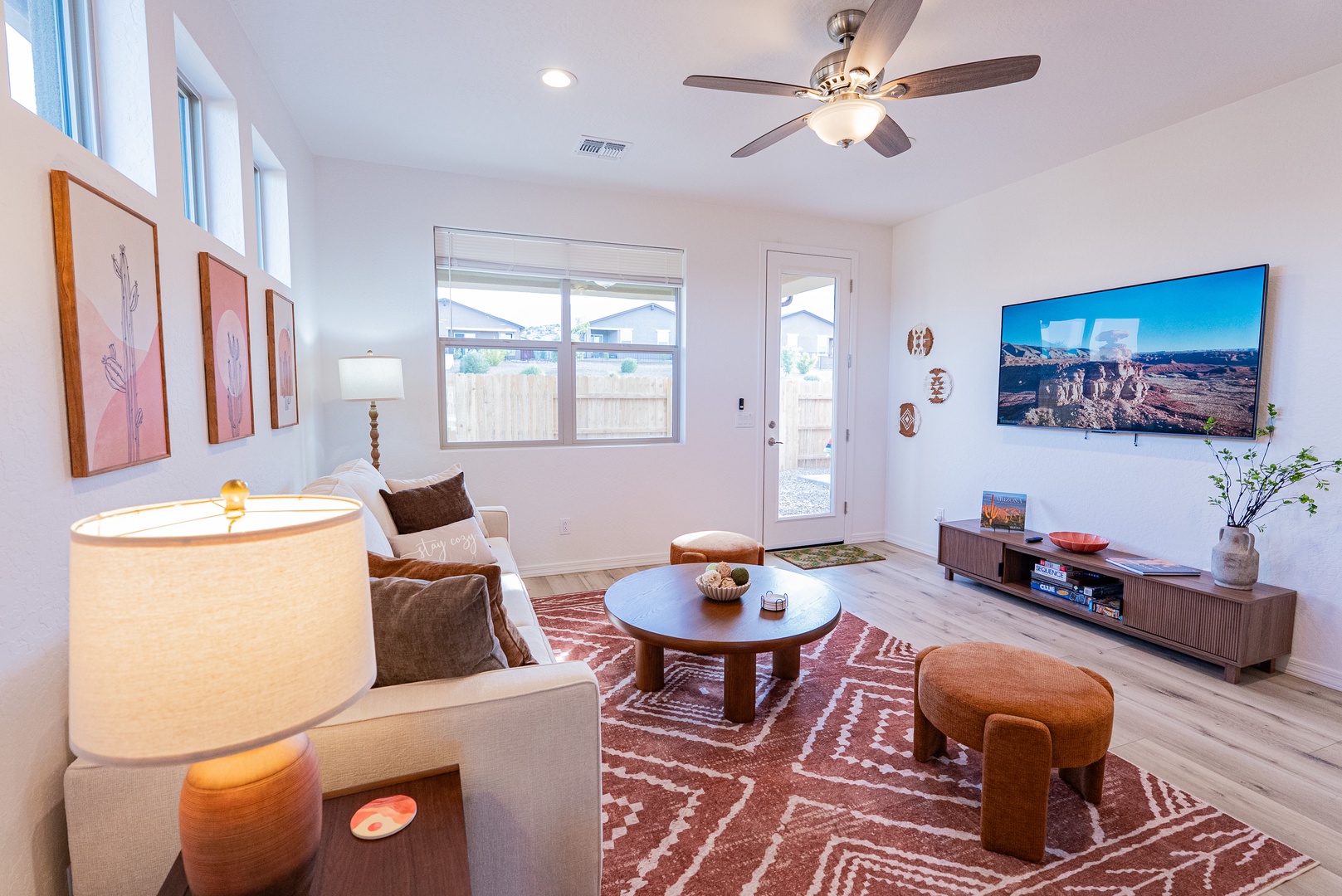 Unwind in your living room with cozy seating and Roku TV