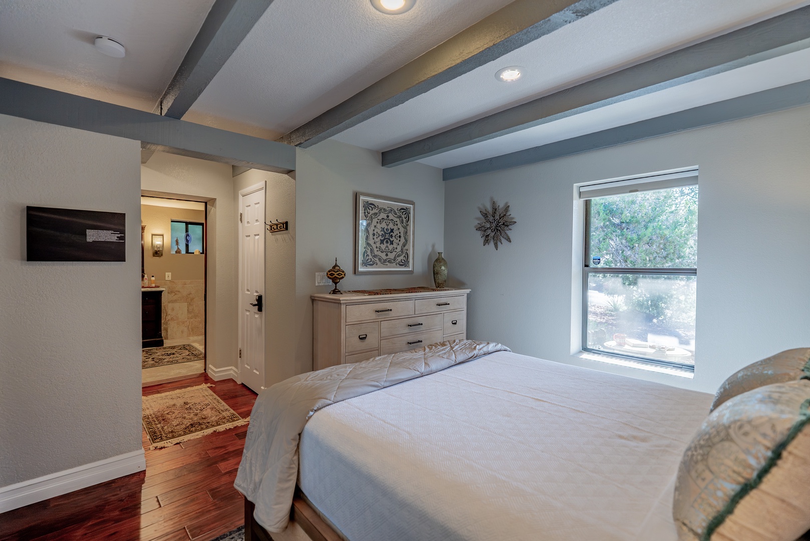 Second ensuite bedroom has its own walk-in bathroom and views of the front patio