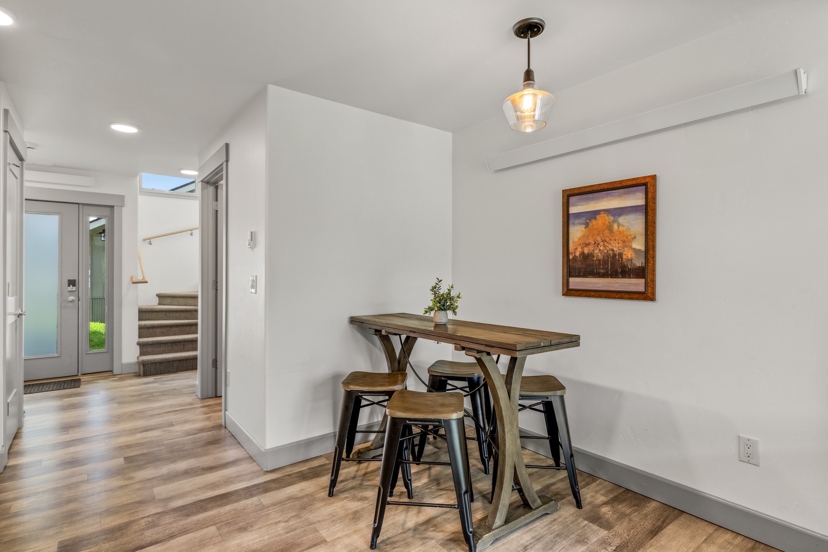 Gather at your cozy bistro table for morning coffee or a casual meal—perfectly sized for intimate conversations and easy living.