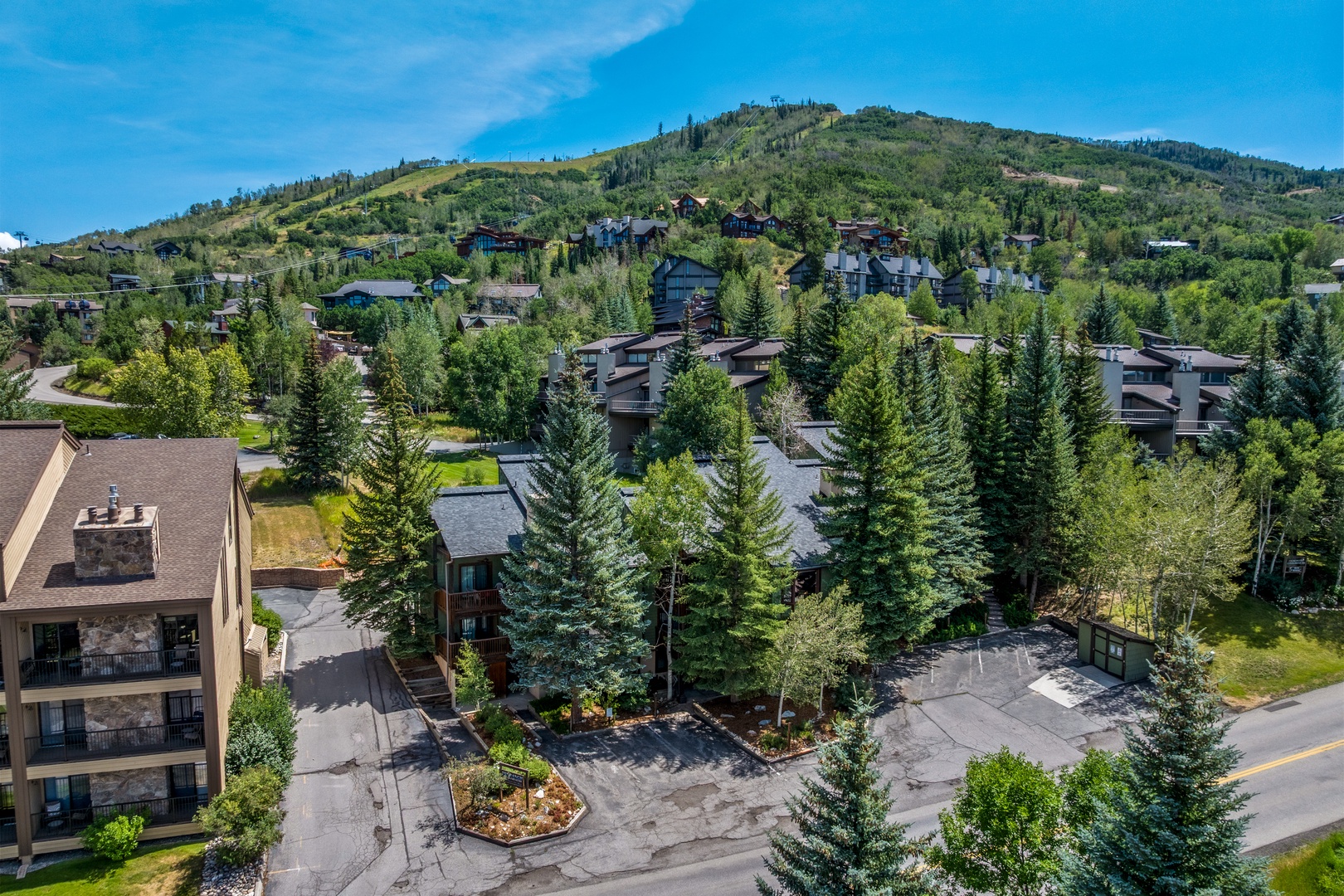 Nestled in a mountain community surrounded by towering evergreens and rolling hillsides, this property offers a peaceful retreat amid natural beauty and alpine charm.