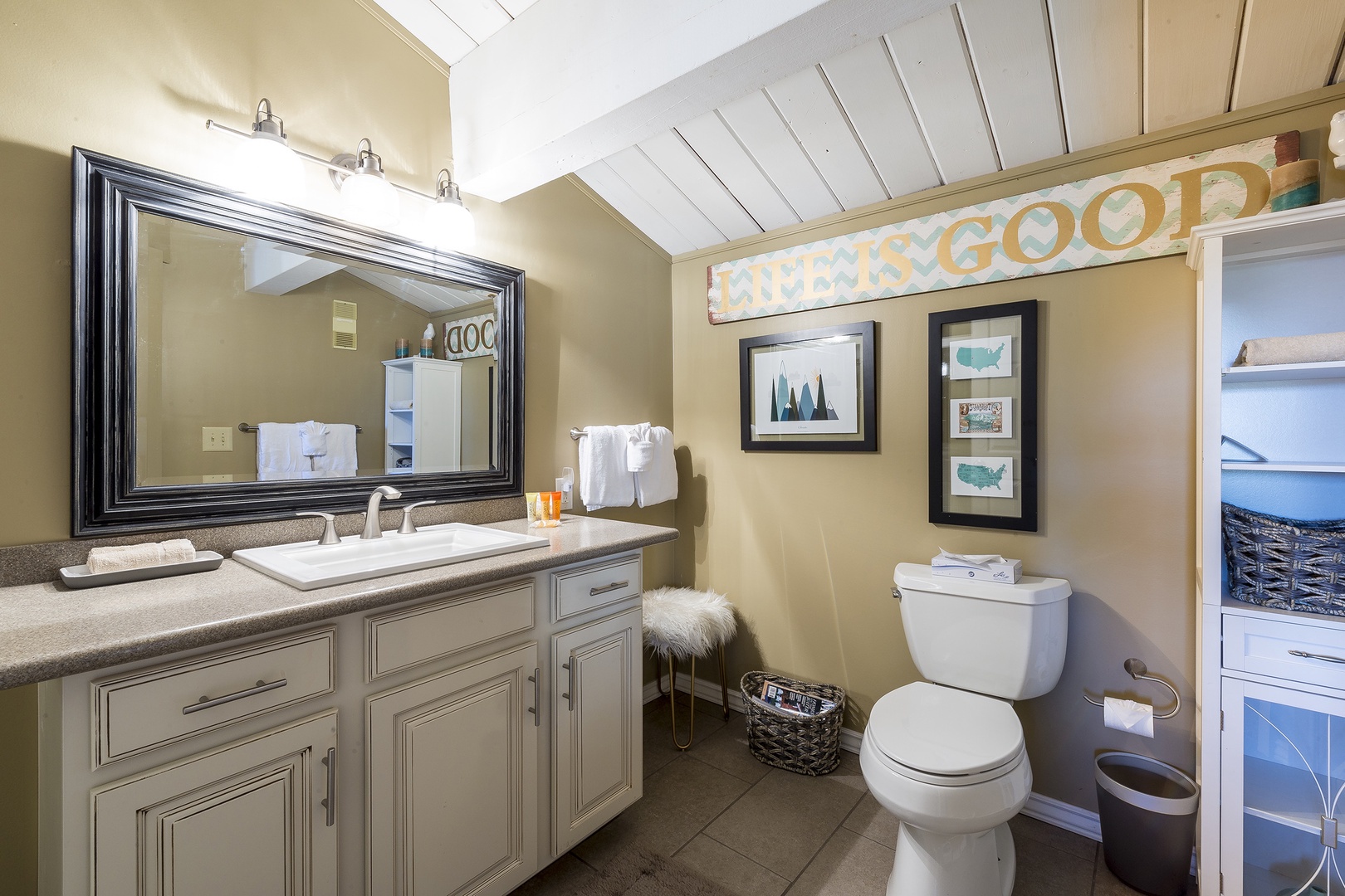 Freshen up in your bright, thoughtfully designed bathroom with plenty of counter space and a cheerful touch. Fluffy towels await after your shower.