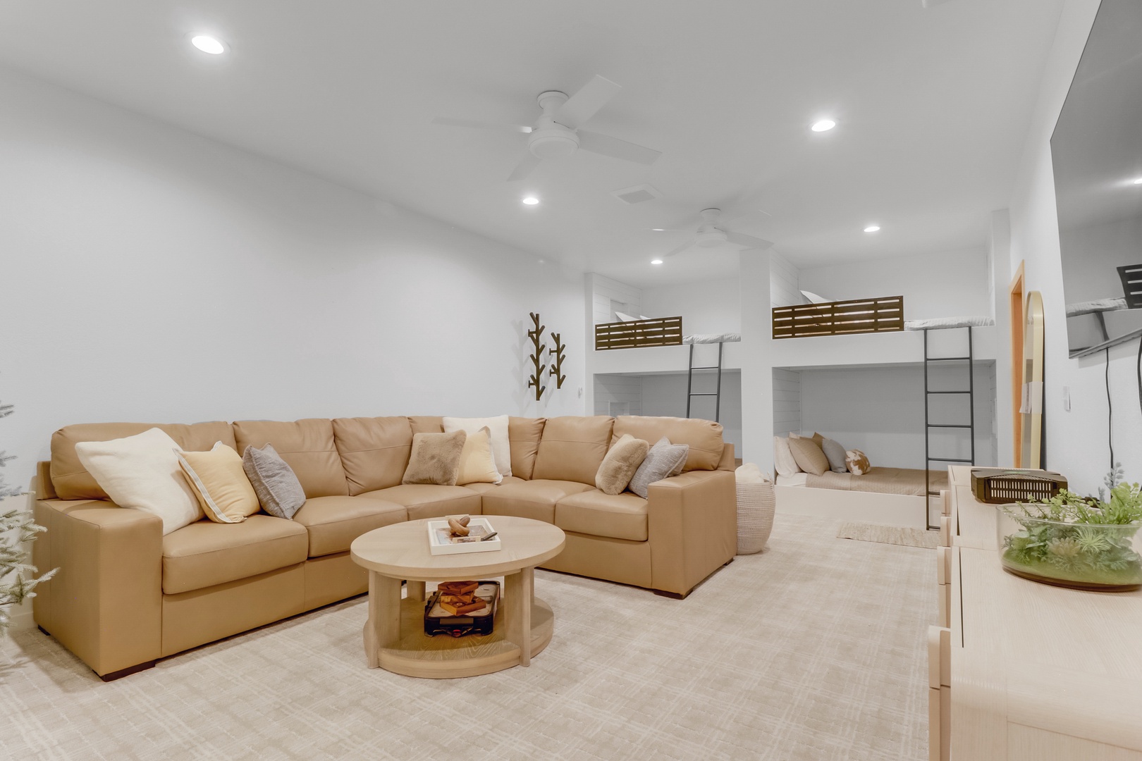 Sink into your spacious living room's plush sectional sofa and feel instantly at home in this bright, open space.