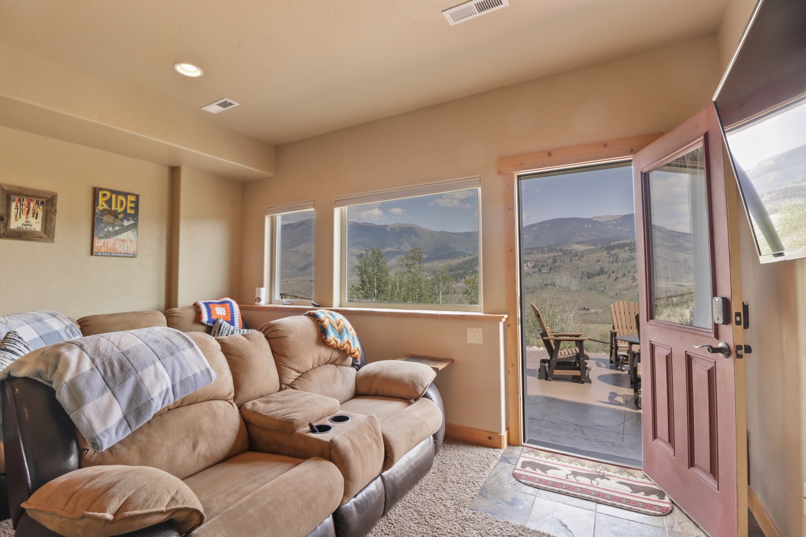 Step into your welcoming living space, where mountain views stretch across the horizon and a private patio beckons you to unwind with morning coffee or evening conversations.
