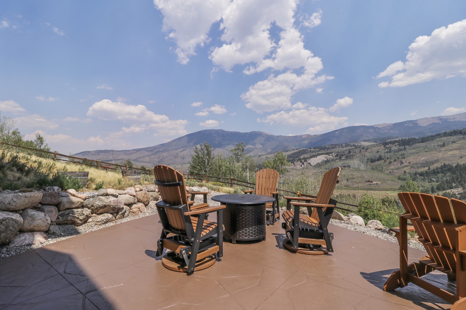 Relax in comfortable Adirondack chairs on your private patio and take in sweeping mountain vistas stretching across the valley—a perfect spot to unwind with morning coffee or evening conversation.