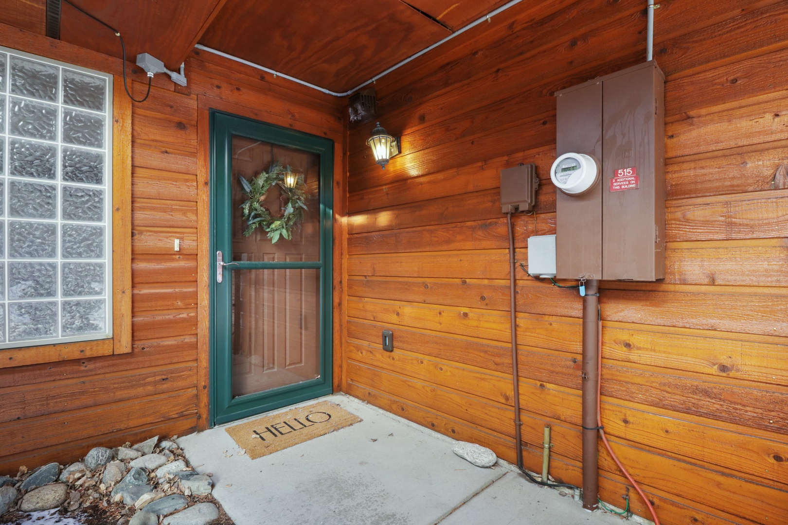 Step through your private entrance into this charming log cabin retreat, where warm wood walls and welcoming touches create the perfect mountain getaway.