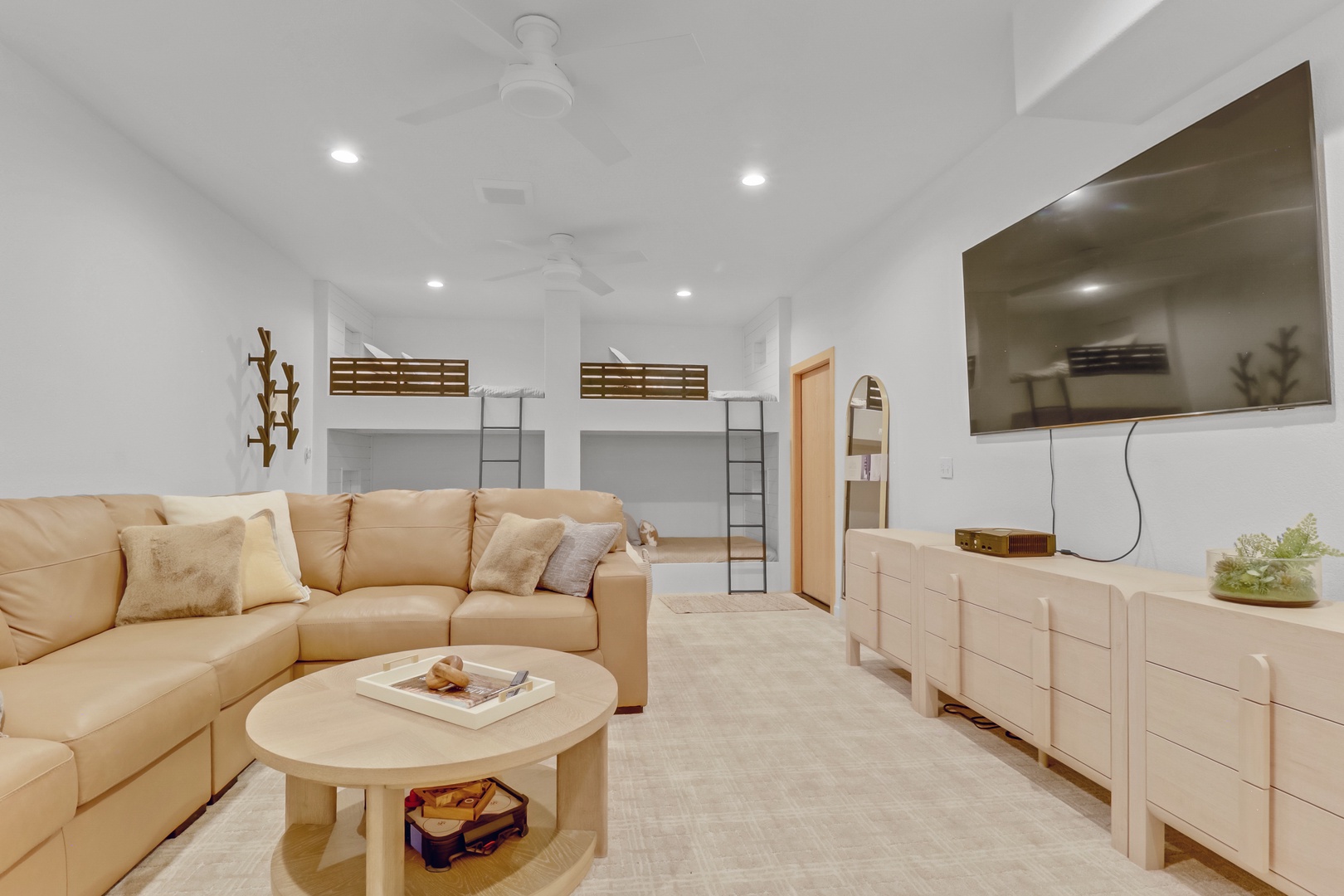 Your stylish space features built-in bunk beds and a cozy sectional sofa, perfect for relaxing after your adventures.