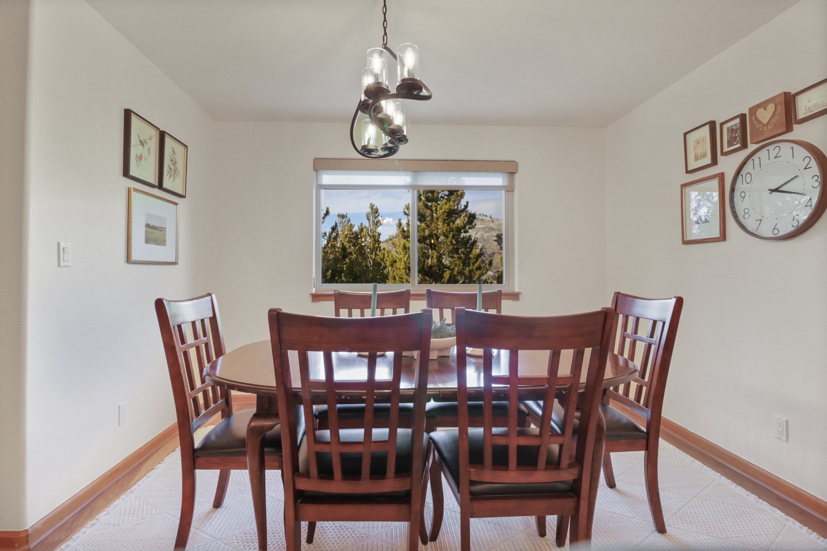 Gather around this warm dining space for memorable meals with mountain views through your window.