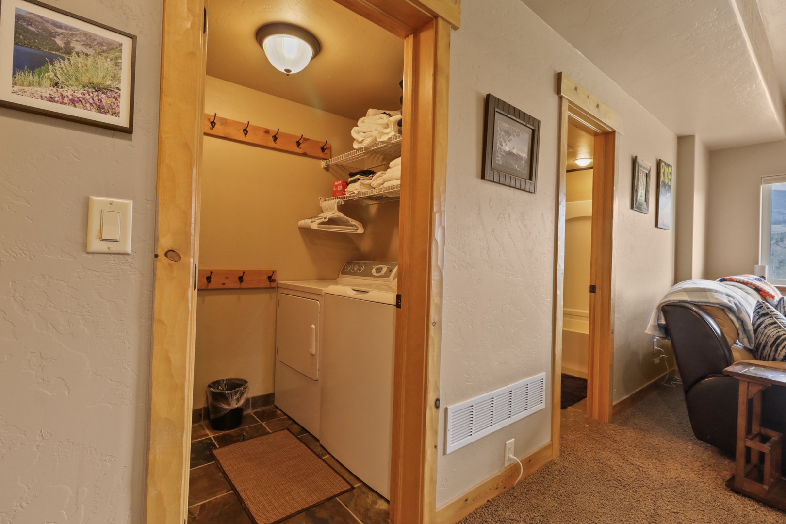 Your in-unit laundry closet keeps things convenient, with a full-sized washer and dryer ready whenever you need them, plus extra towels and hangers.