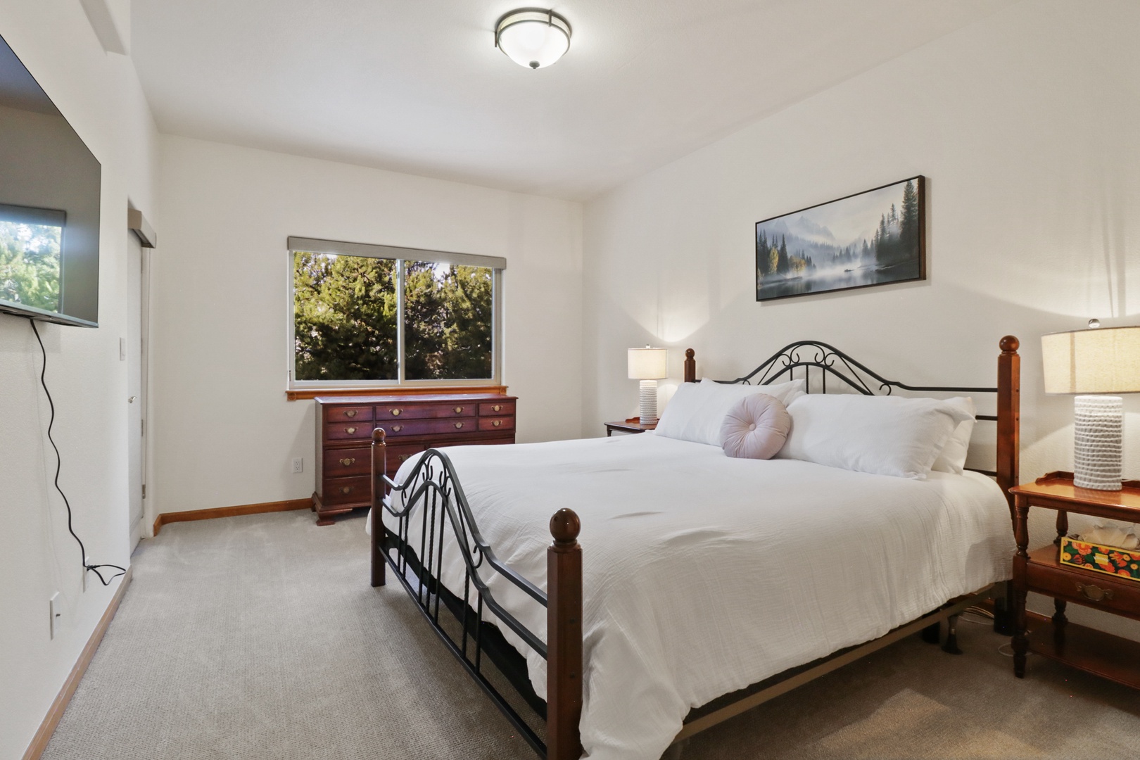 Sink into crisp linens and drift off peacefully while garden views greet you each morning through your private window.