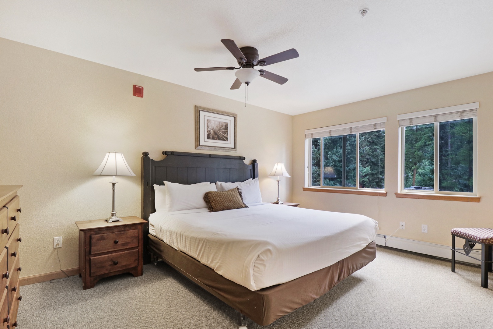 Rest easy in your comfortable bedroom, where soft linens and warm lighting create a peaceful retreat after your daily adventures.